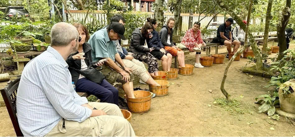 Having lunch and relaxing with herbal foots bath